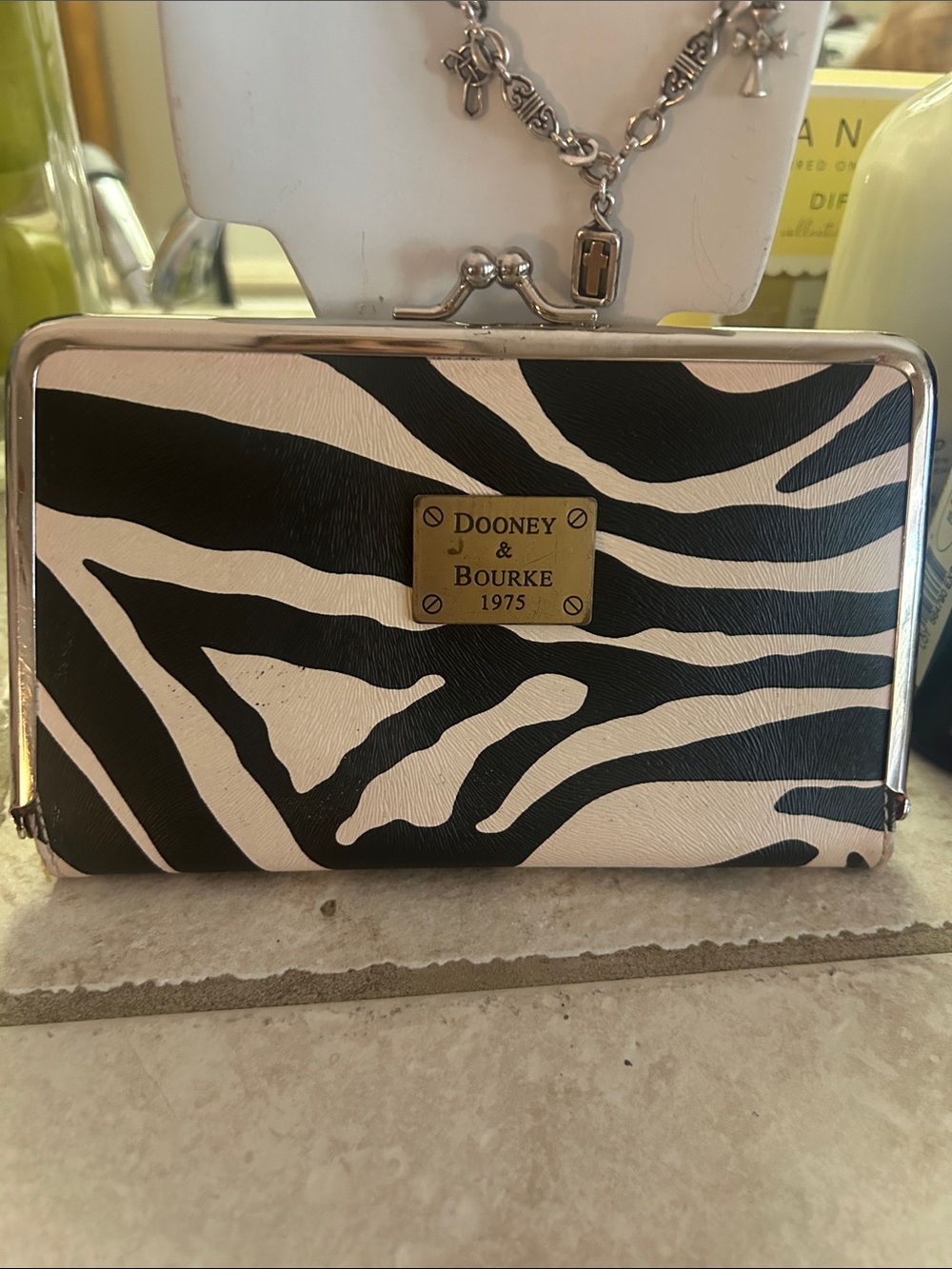 Dooney & Bourke Black and White Zebra-Print Frame Clutch